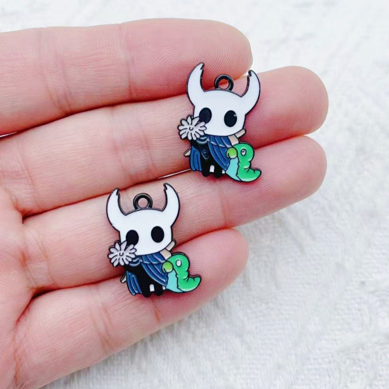 10 pendentifs en alliage motif - Party Games Ideas avis et prix