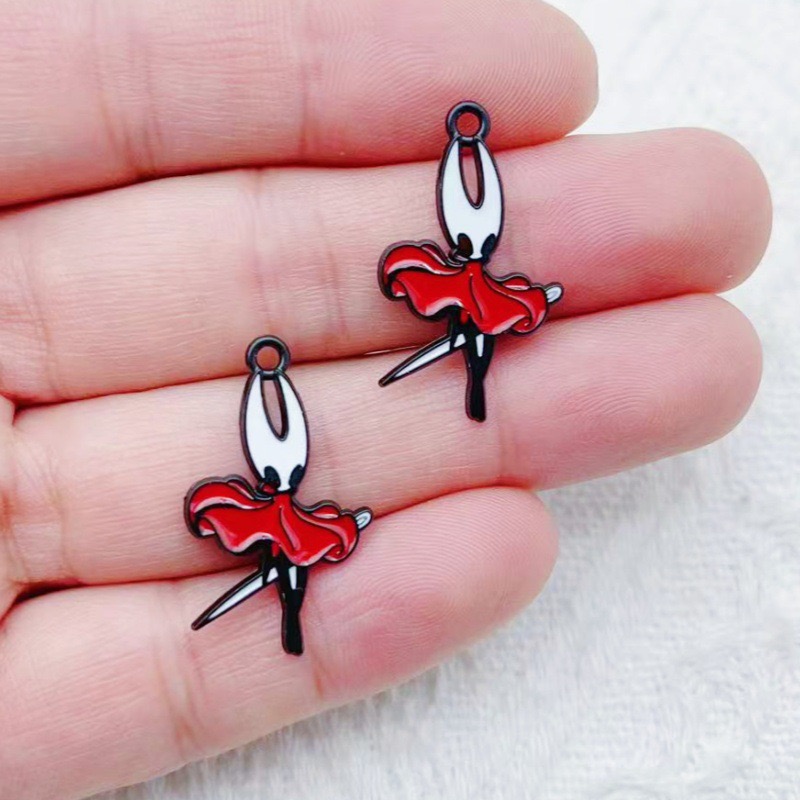 10 pendentifs en alliage motif - Party Games Ideas avis et prix