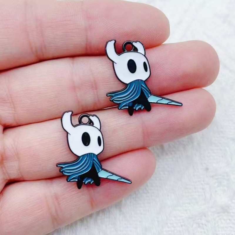 10 pendentifs en alliage motif - Party Games Ideas avis et prix